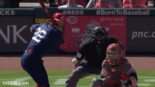 Baseball Player Number 12 Swings At Pitch GIF