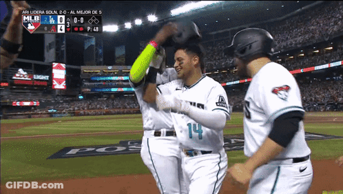 Baseball Player Number 14 Hugging Another Player GIF