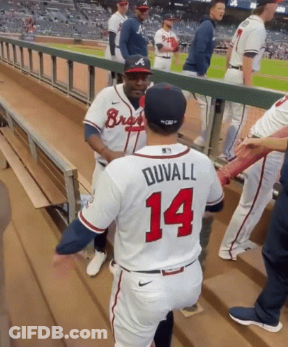 Baseball Player Number 14 Talking To Another GIF