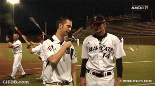 Baseball Player Number 14 Talking To Reporter GIF