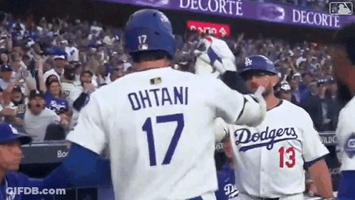 Baseball Player Number 17 Being Congratulated GIF