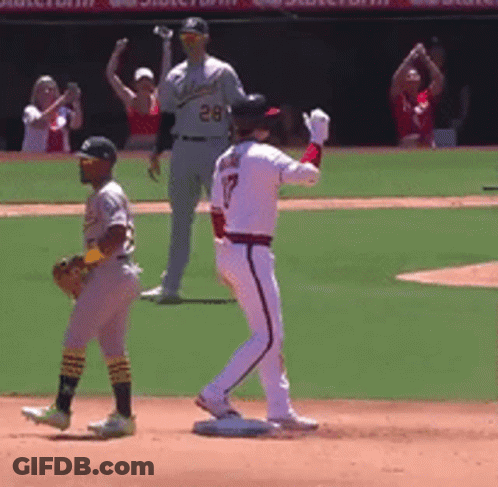 Baseball Player Number 17 Walking Towards Base GIF
