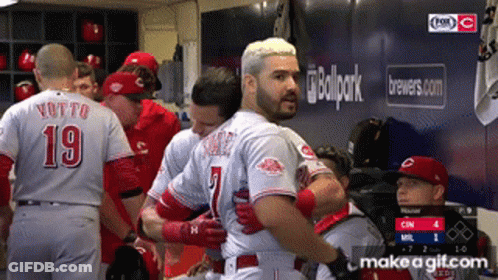 Baseball Player Number 19 Hugging Another Player GIF