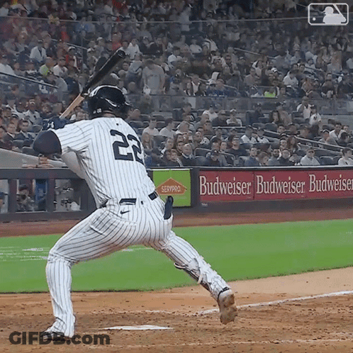 Baseball Player Number 22 Swinging At Ball GIF