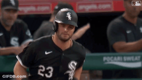 Baseball Player Number 23 Running Towards Dugout GIF