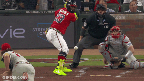 Baseball Player Number 23 Swinging At Ball GIF