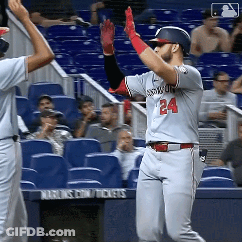 Baseball Player Number 24 High Fives Teammate GIF