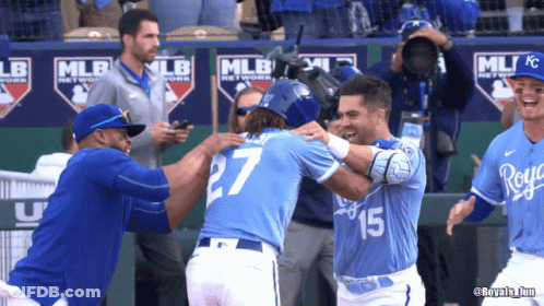 Baseball Player Number 27 Hugging Teammate GIF