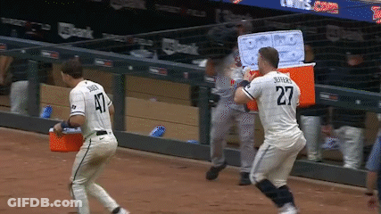 Baseball Player Number 27 Running Towards Another GIF