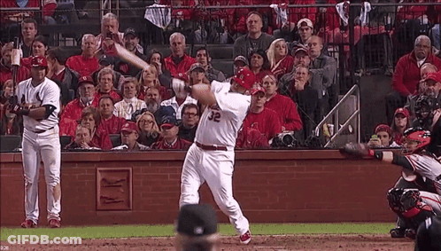Baseball Player Number 32 Swinging Bat GIF