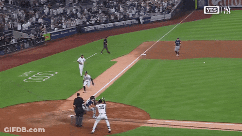 Baseball Player Number 35 Sliding Into Home Plate GIF