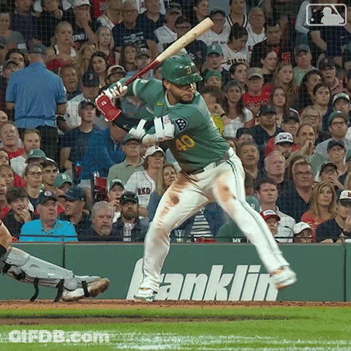 Baseball Player Number 40 Swinging At Ball GIF