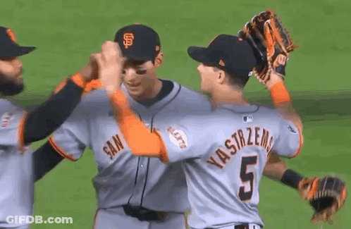 Baseball Player Number 5 Giving High Five GIF