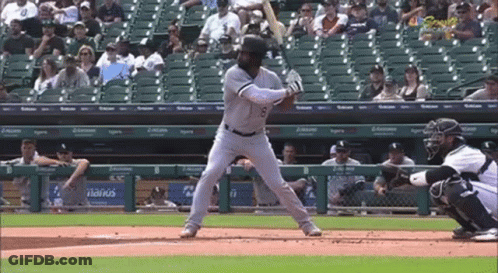 Baseball Player Number 8 Preparing To Bat GIF