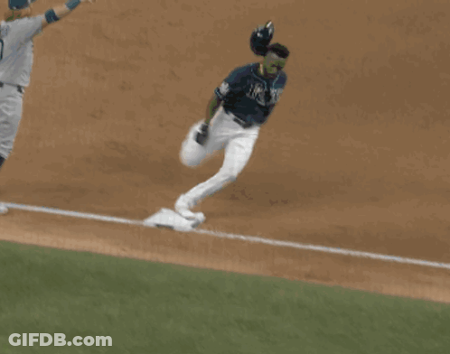 Baseball Player Number 9 Sliding Into Base GIF