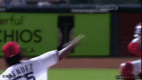 Baseball Player Ready To Hit Ball With Catcher And Umpire GIF