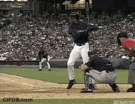 Baseball Player Ready To Swing, Catcher Watches GIF
