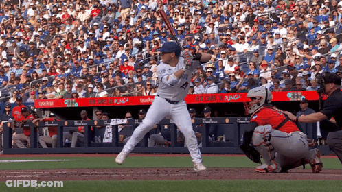 Baseball Player Ready To Swing With Blue Cross For Punch Banner GIF