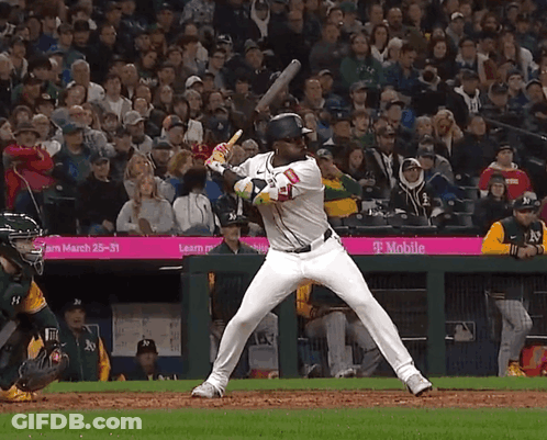 Baseball Player Ready To Swing With T-Mobile Banner GIF