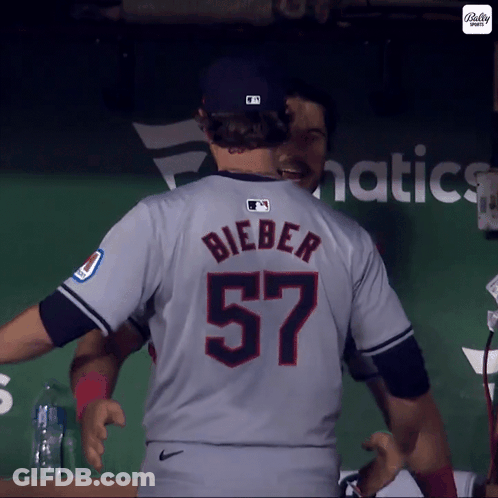 Baseball Player Running In Front Of Blaster Sign GIF