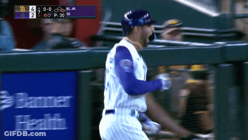Baseball Player Running Past Health Sign Banner GIF