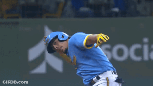 Baseball Player Running To Catch Ball While Another Watches GIF
