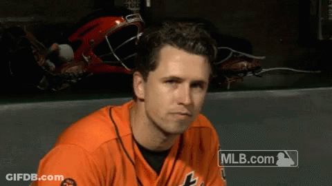 Baseball Player Sitting In Dugout GIF