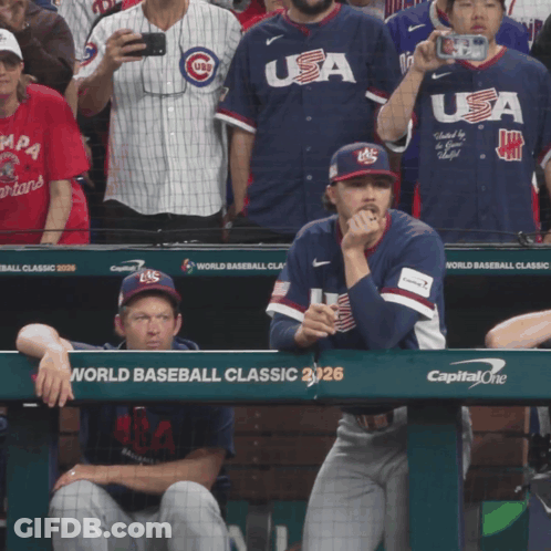 Baseball Player Sitting In Dugout GIF