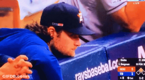Baseball Player Sitting In Dugout With Raysbaseball.com GIF