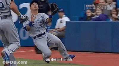 Baseball Player Sliding Into Base In Kansas City Uniform GIF