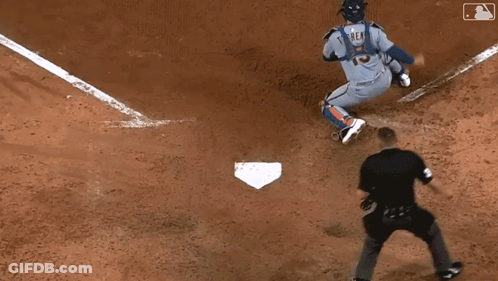 Baseball Player Sliding Into Base With Referee Watching GIF