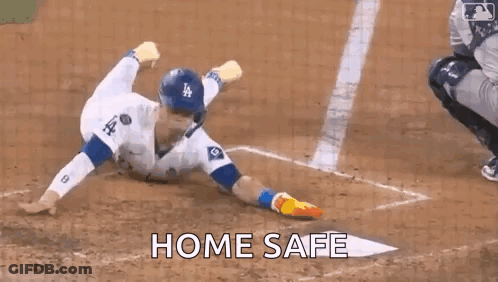 Baseball Player Sliding Into Home Plate Saying Home Safe GIF