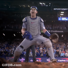 Baseball Player Standing In Front Of TD Clubhouse Sign GIF