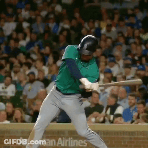 Baseball Player Swinging At Ball By American Airlines Sign GIF