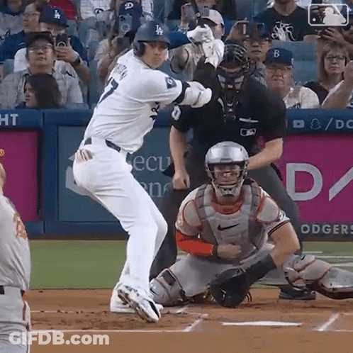 Baseball Player Swinging At Ball Catcher Watching GIF