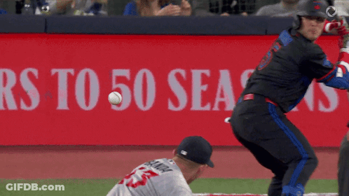 Baseball Player Swinging At Ball In Front Of RS To 50 Seasons Sign GIF