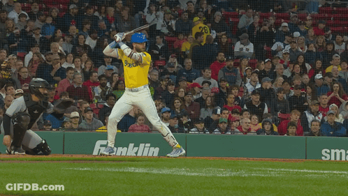 Baseball Player Swinging At Ball In Front Of Smartwater Ad GIF
