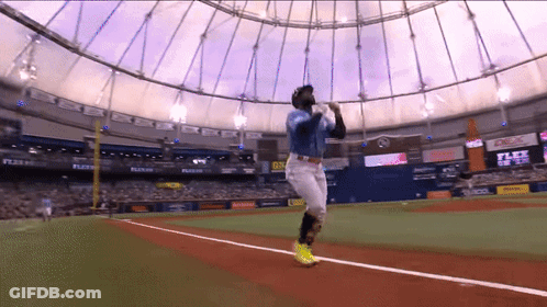 Baseball Player Swinging At Ball In Stadium With Flex Walls GIF