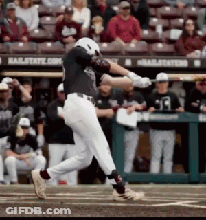 Baseball Player Swinging At Ball Near Hailstate Sign GIF