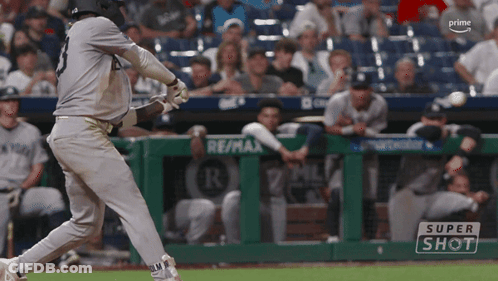 Baseball Player Swinging At Ball Saying Super Shot GIF