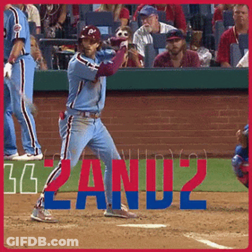 Baseball Player Swinging At Ball With Zand2 Behind GIF