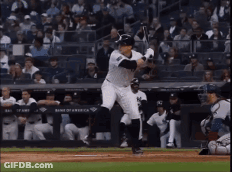 Baseball Player Swinging At Ball GIF