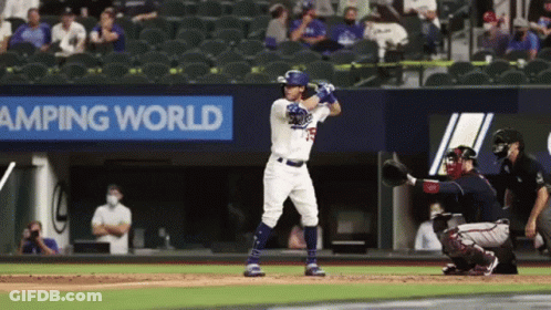 Baseball Player Swinging At Pitch GIF