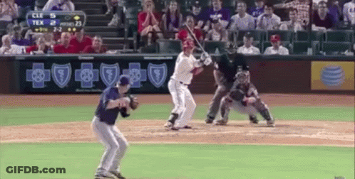 Baseball Player Swinging At Pitch GIF