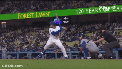 Baseball Player Swinging At Pitch GIF
