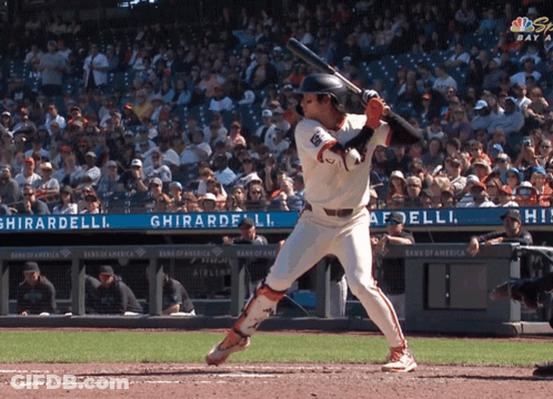 Baseball Player Swinging At Pitch GIF
