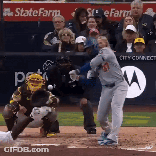 Baseball Player Swinging At Pitch GIF