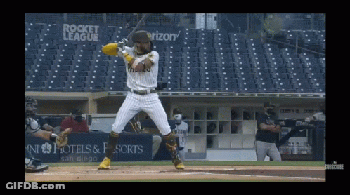 Baseball Player Swinging At Pitch Near Rocket League Sign GIF