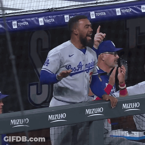 Baseball Player Swinging At Pitch GIF