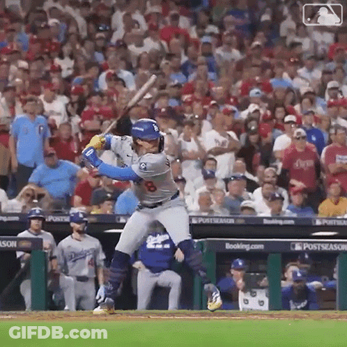 Baseball Player Swinging Bat As Crowd Watches GIF